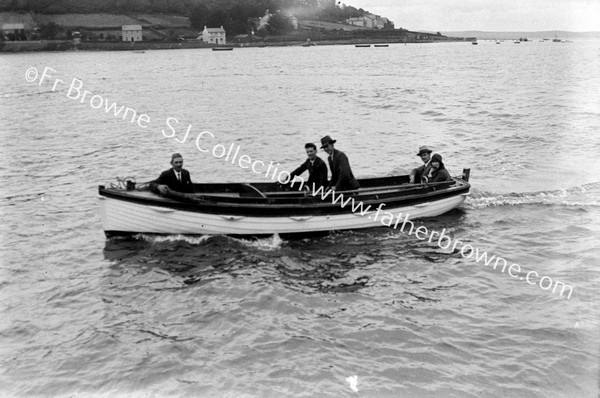 MR POWELL (OF COBH) WITH HIS MOTOR BOAT WITH HIS DAUGHER IN LAW